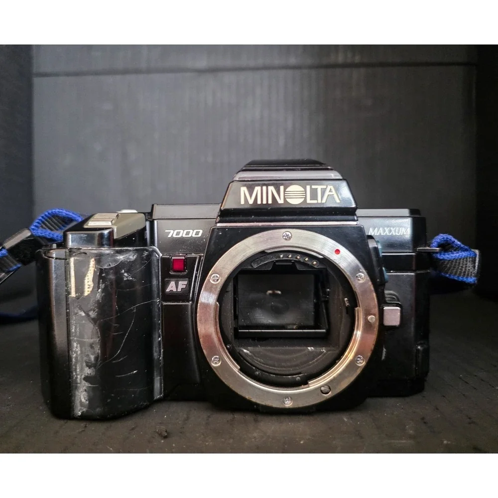 Minolta Maxxum 7000 35mm SLR Film Camera with 28-300, 70-210, and 28-85 Lenses